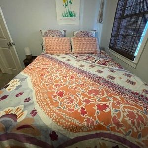 Anthropologie Bedding duvet with matching Euro shams and queen pillowcases.